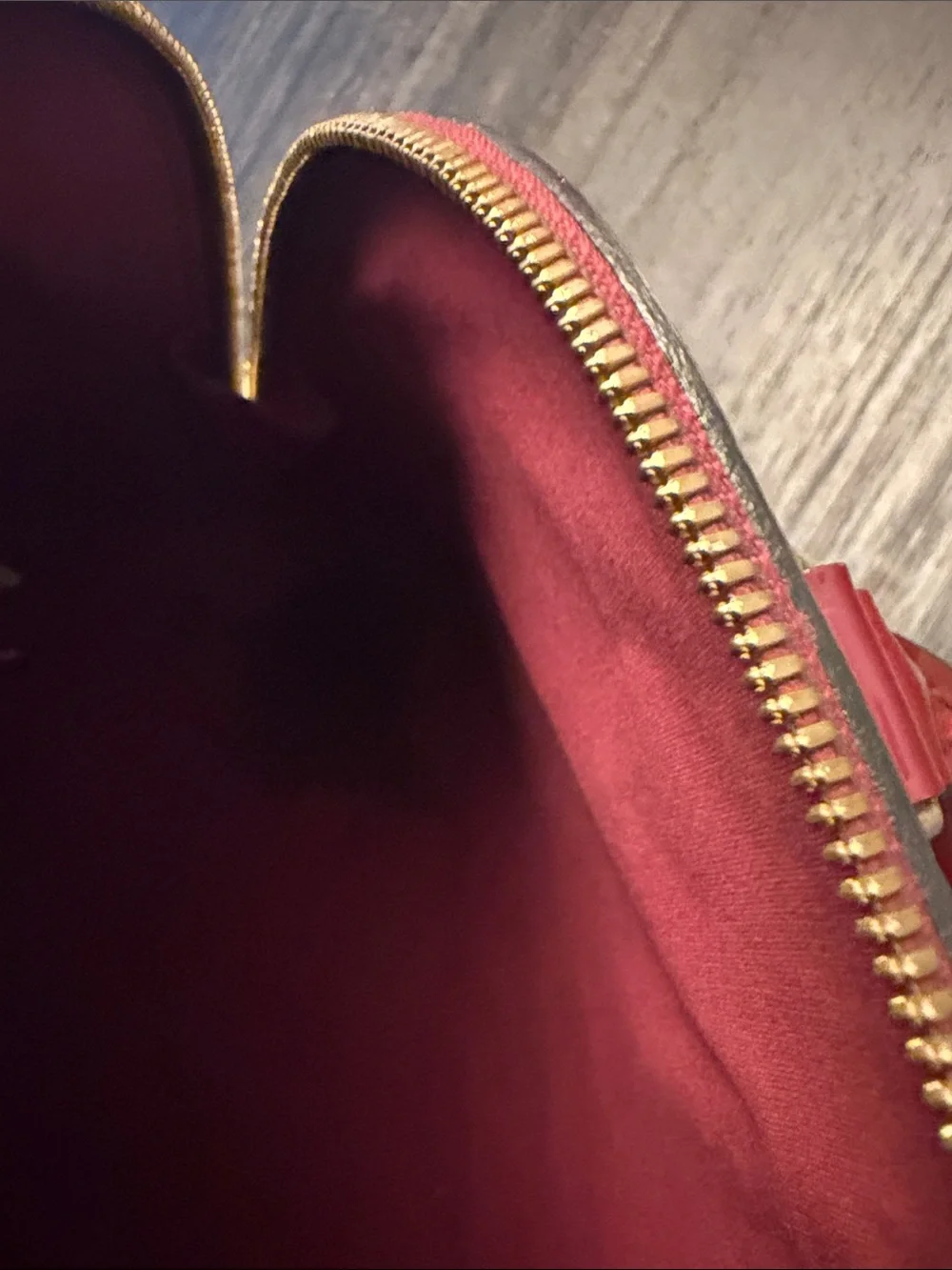 Louis Vuitton Burgundy Leather purse with Gold Hardware